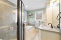 5754 Highway 20 Due West, SC 29639 - Photo 7 of 15 This serene bathroom offers a spacious layout with a glass-enclosed shower and separate soaking tub.