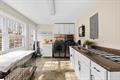 5754 Highway 20 Due West, SC 29639 - Photo 8 of 15 This spacious kitchen offers abundant natural light, creating an inviting and bright atmosphere for culinary pursuits.