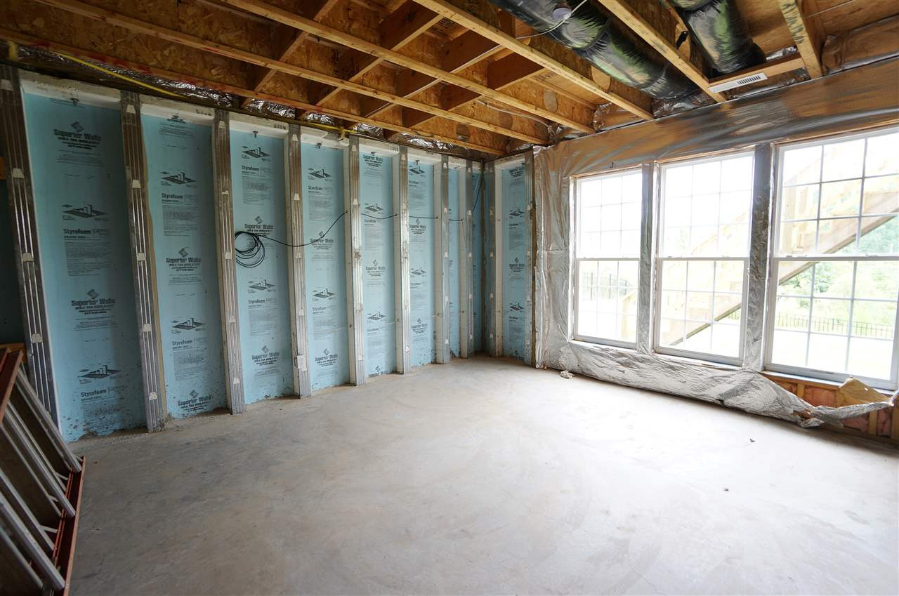 7730 San Gabriel Street Raleigh, NC 27613 - Photo 24 of 25 Basement has exterior entrance & lots of potential. Unfinished Basement
