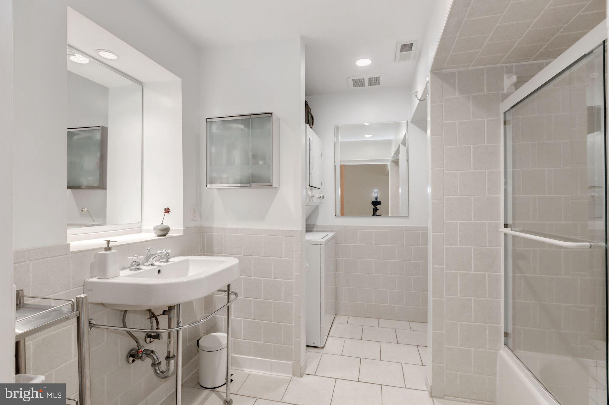 3541 S Street Northwest Washington, DC 20007 - Photo 23 of 29 Full bath with stackable washer/dryer
