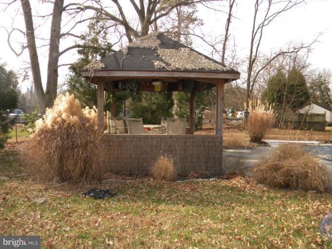 1830 Cedar Road Pasadena, MD 21122 - Photo 14 of 28 Tiki Bar with sound and electric!