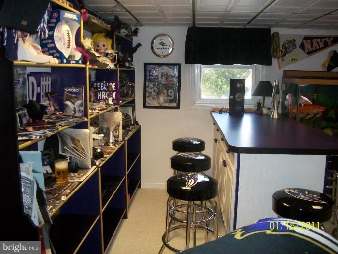 1830 Cedar Road Pasadena, MD 21122 - Photo 25 of 28 Beautiful shelving in bar area!