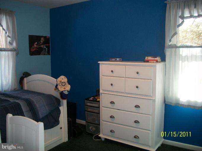 1830 Cedar Road Pasadena, MD 21122 - Photo 7 of 28 Third main floor bedroom