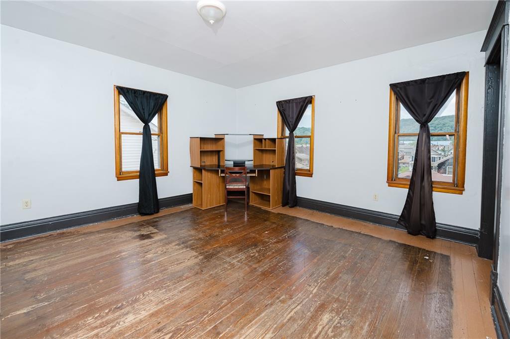 634 Ridge Avenue Ford City, PA 16226 - Photo 22 of 30 a view of livingroom with hardwood floor and window