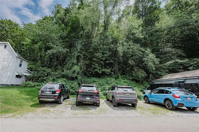 a car parked in front of a house