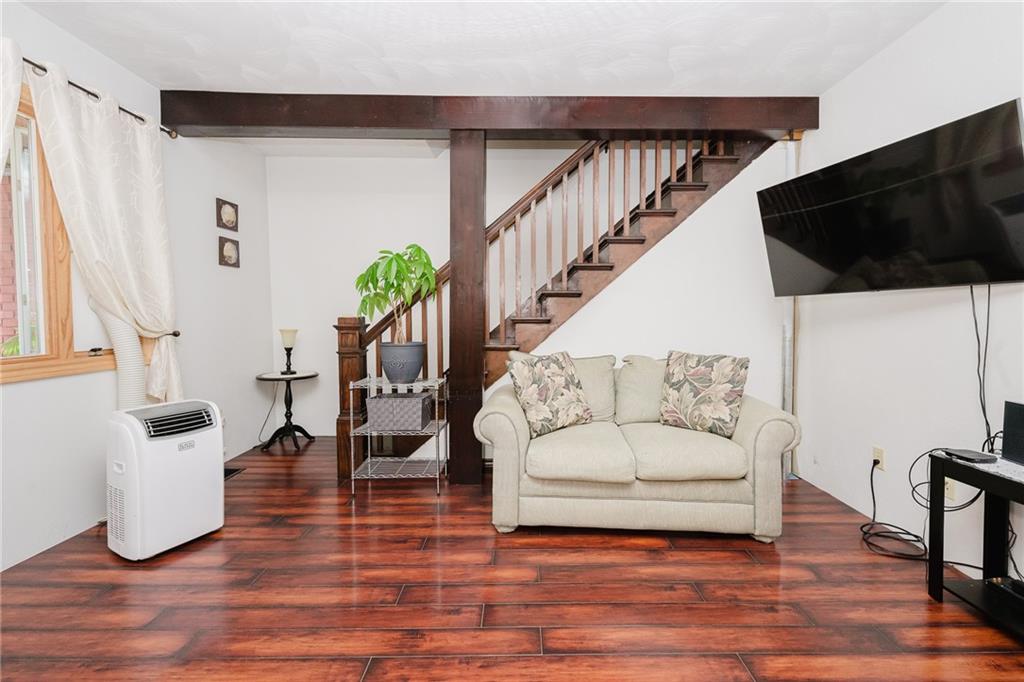 634 Ridge Avenue Ford City, PA 16226 - Photo 4 of 30 a living room with furniture and a potted plant