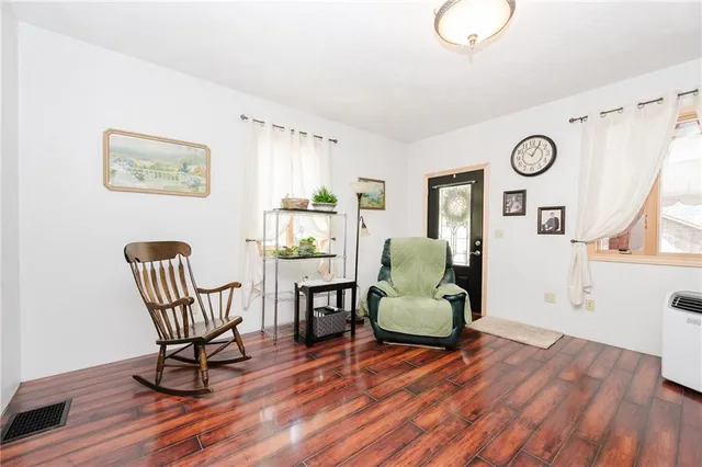 a living room with furniture and a table