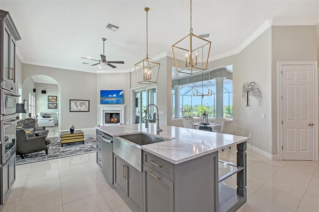 520 Rye Road Northeast Bradenton, FL 34212 - Photo 15 of 88 a kitchen with a sink a counter space appliances and cabinets