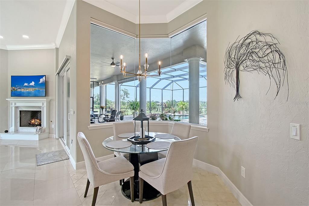 520 Rye Road Northeast Bradenton, FL 34212 - Photo 18 of 88 a view of a dining room with furniture window and outside view