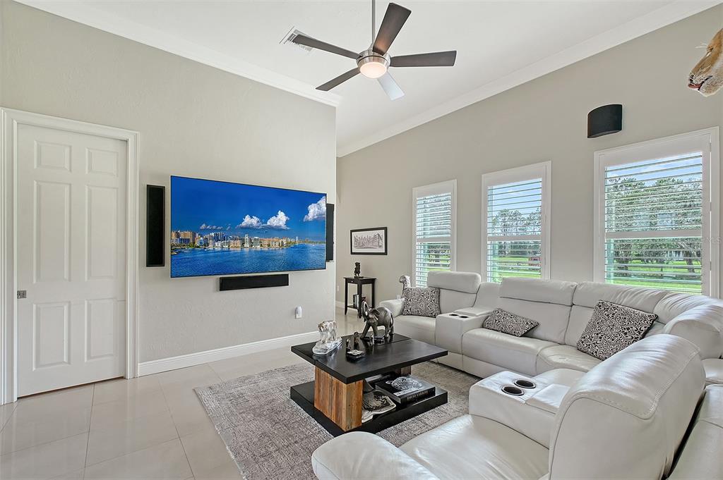 520 Rye Road Northeast Bradenton, FL 34212 - Photo 23 of 88 a living room with furniture and a large window