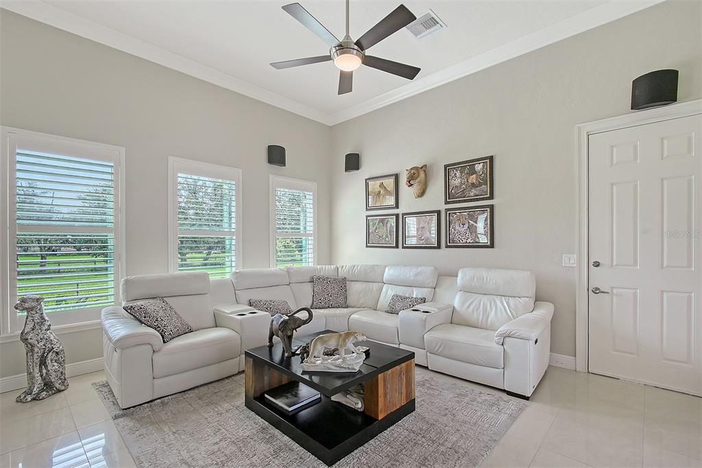 520 Rye Road Northeast Bradenton, FL 34212 - Photo 24 of 88 a living room with furniture and a large window