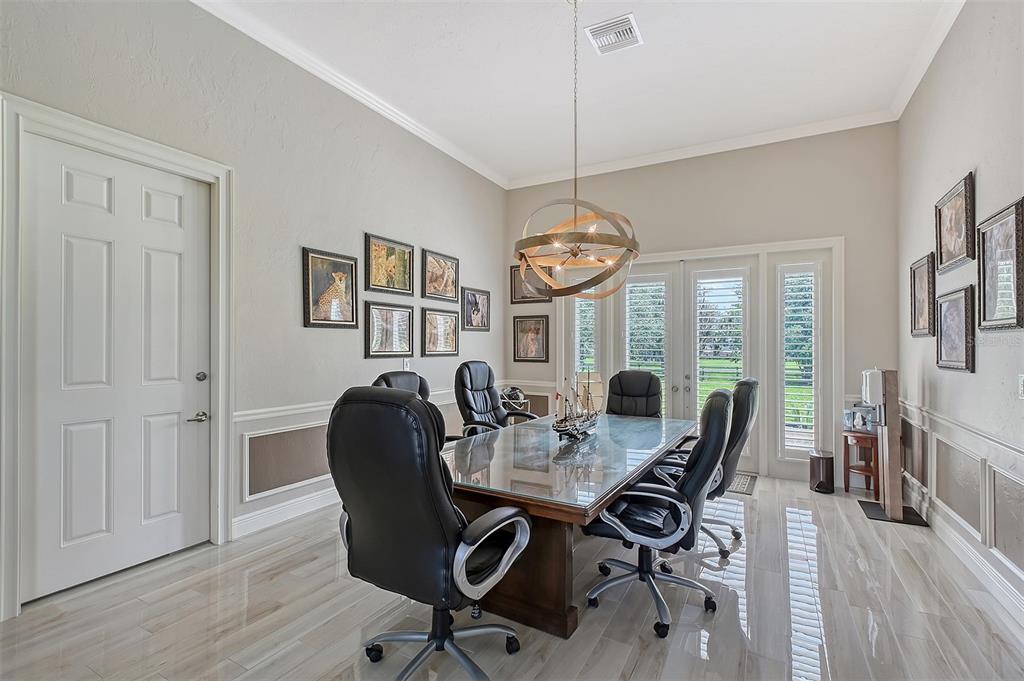 520 Rye Road Northeast Bradenton, FL 34212 - Photo 26 of 88 a view of a dining room with furniture window and wooden floor