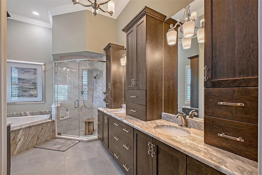 520 Rye Road Northeast Bradenton, FL 34212 - Photo 36 of 88 a spacious bathroom with a double vanity sink mirror double and shower