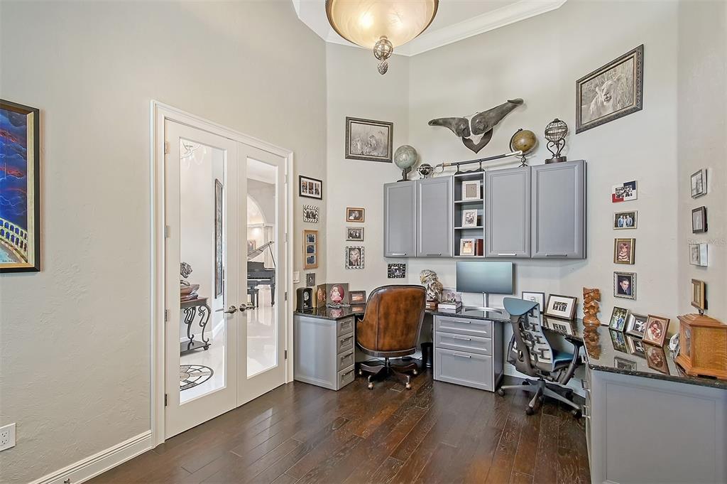 520 Rye Road Northeast Bradenton, FL 34212 - Photo 42 of 88 a view of a workspace with furniture and a window