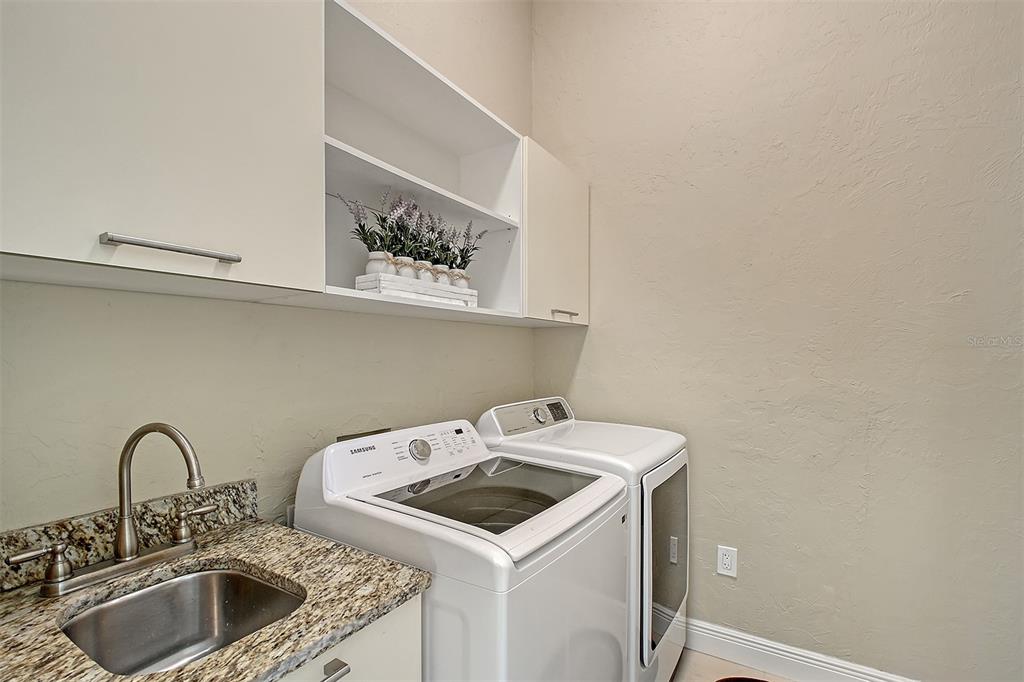 520 Rye Road Northeast Bradenton, FL 34212 - Photo 57 of 88 a utility room with sink dryer and washer