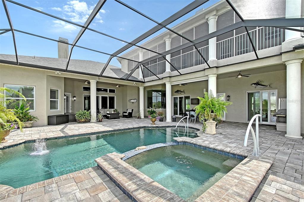520 Rye Road Northeast Bradenton, FL 34212 - Photo 63 of 88 a view of a house with swimming pool and sitting area