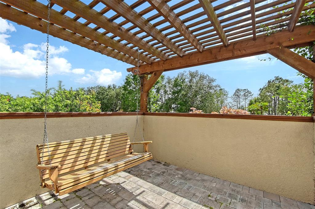 520 Rye Road Northeast Bradenton, FL 34212 - Photo 70 of 88 a view of balcony with wooden floor and fence