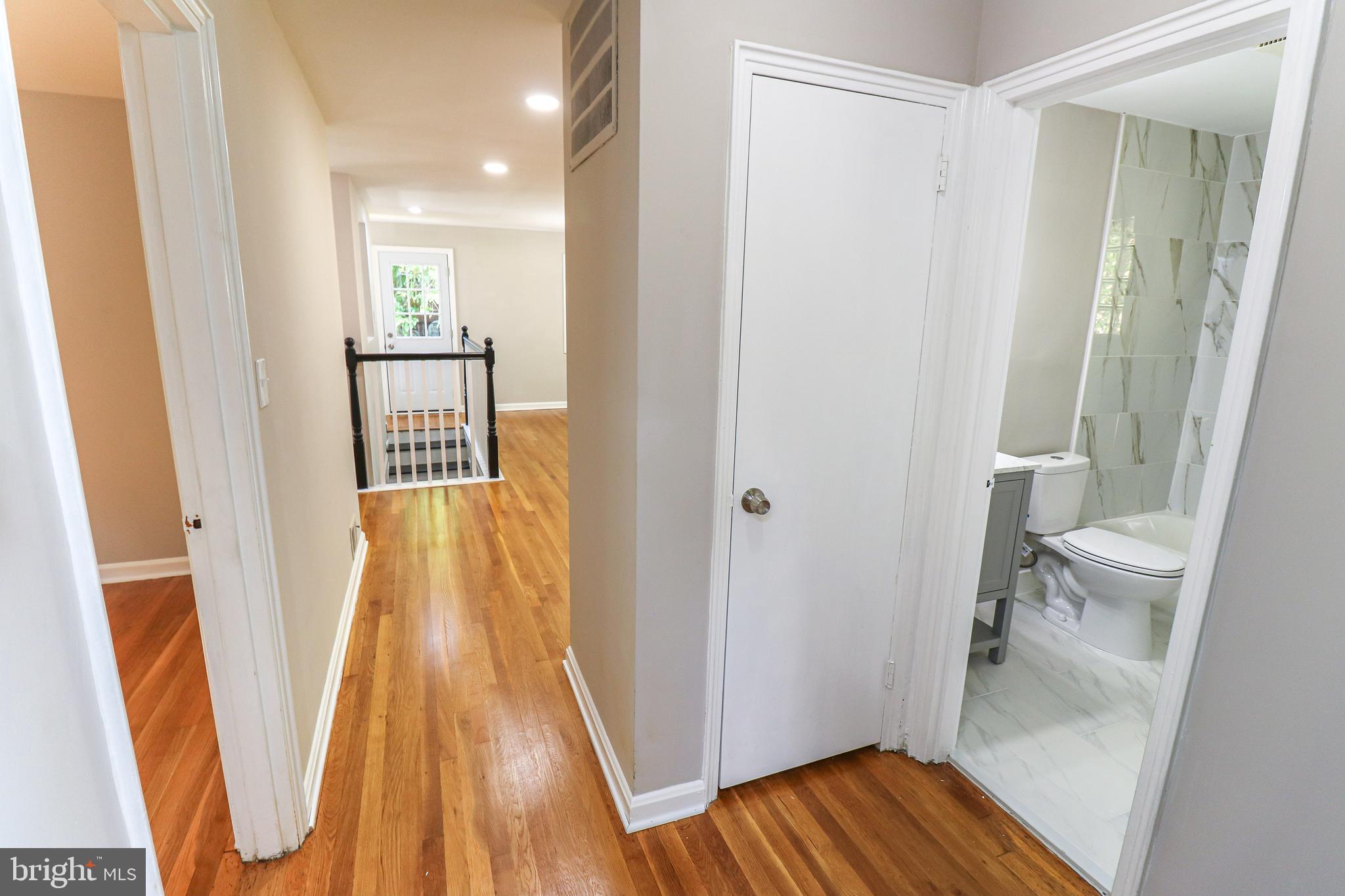 10413 Royal Road Silver Spring, MD 20903 - Photo 17 of 36 Upstairs Hallway out to Living Room