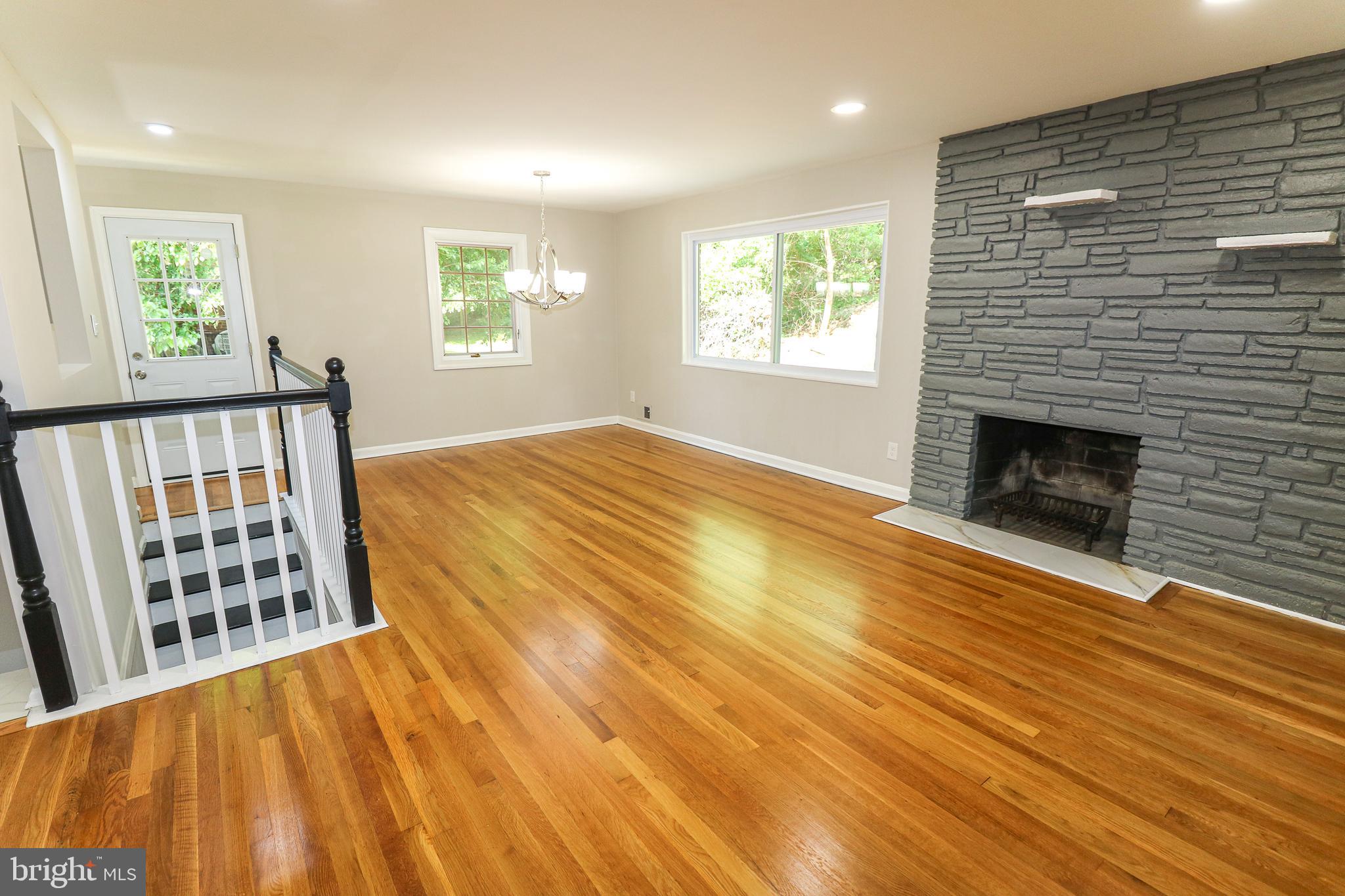 10413 Royal Road Silver Spring, MD 20903 - Photo 8 of 36 Opposite side view of living room and fireplace
