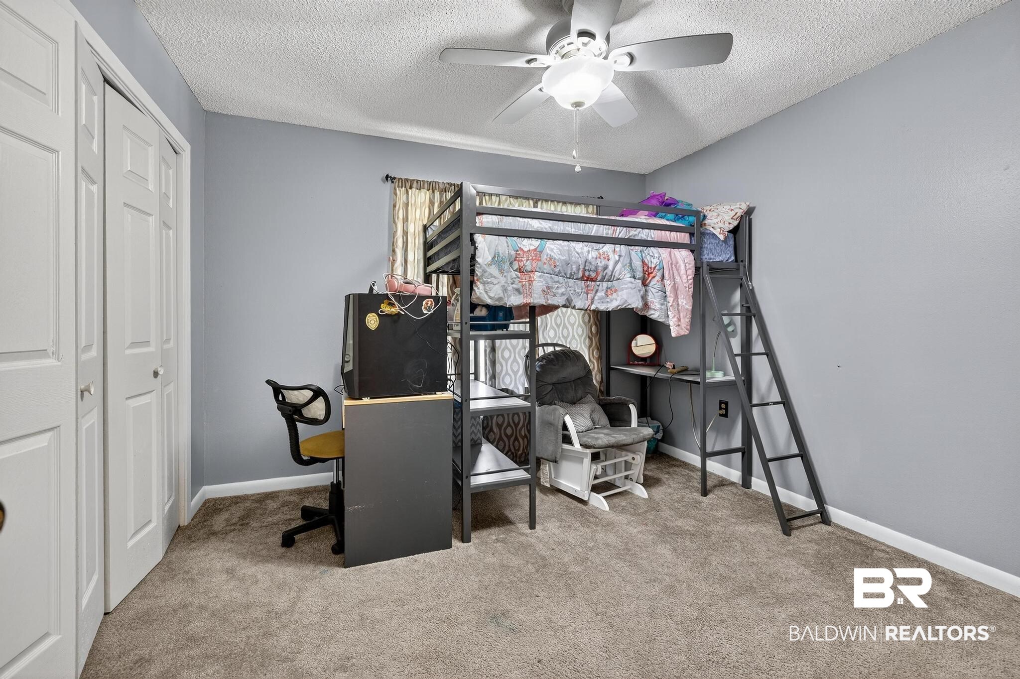 21895 2nd Street Silverhill, AL 36576 - Photo 37 of 43 Bedroom featuring light colored carpet, a closet, and ceiling fan