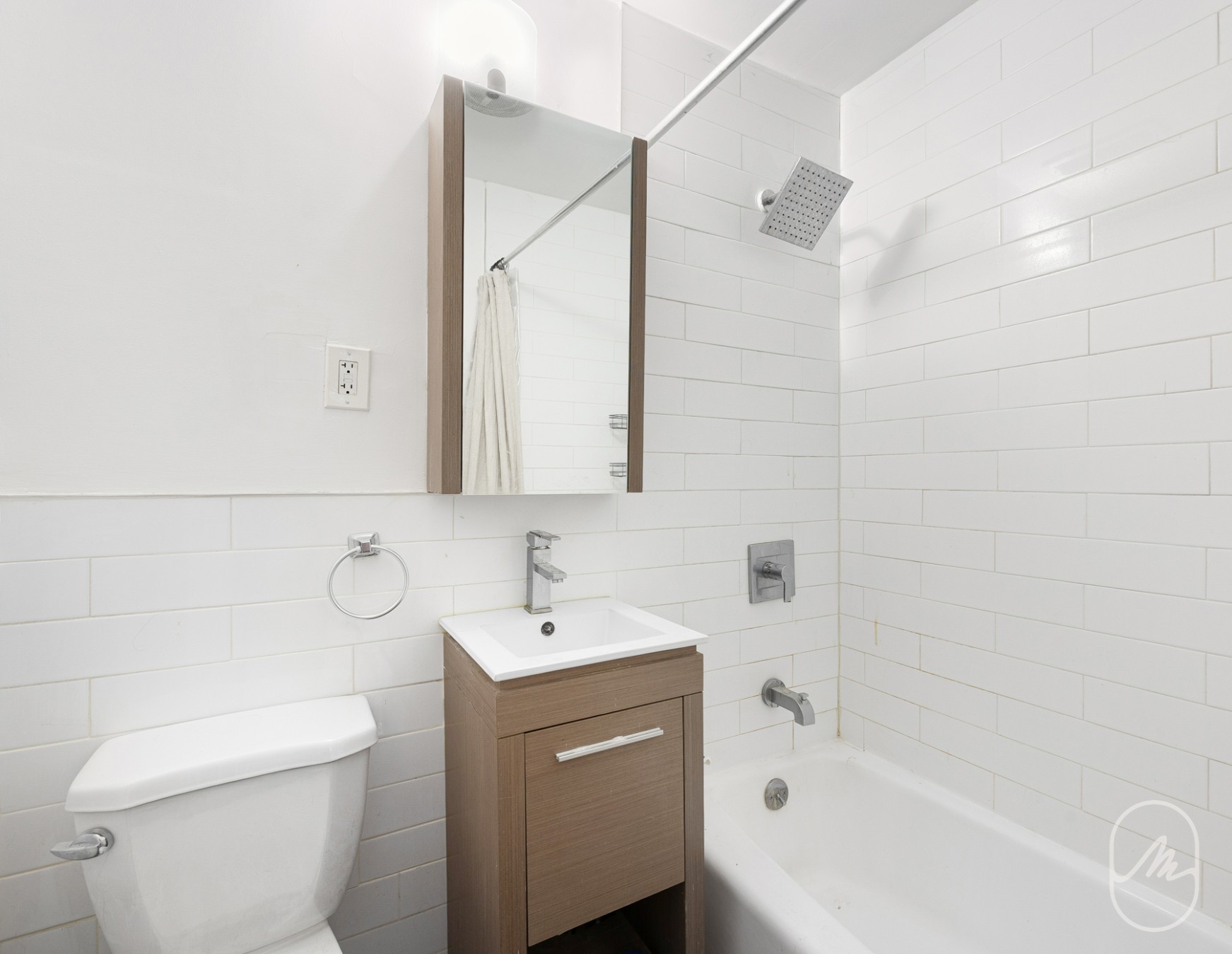 348 West 21st Street, Unit 4F Manhattan, NY 10011 - Photo 9 of 10 a bathroom with a sink a toilet and shower