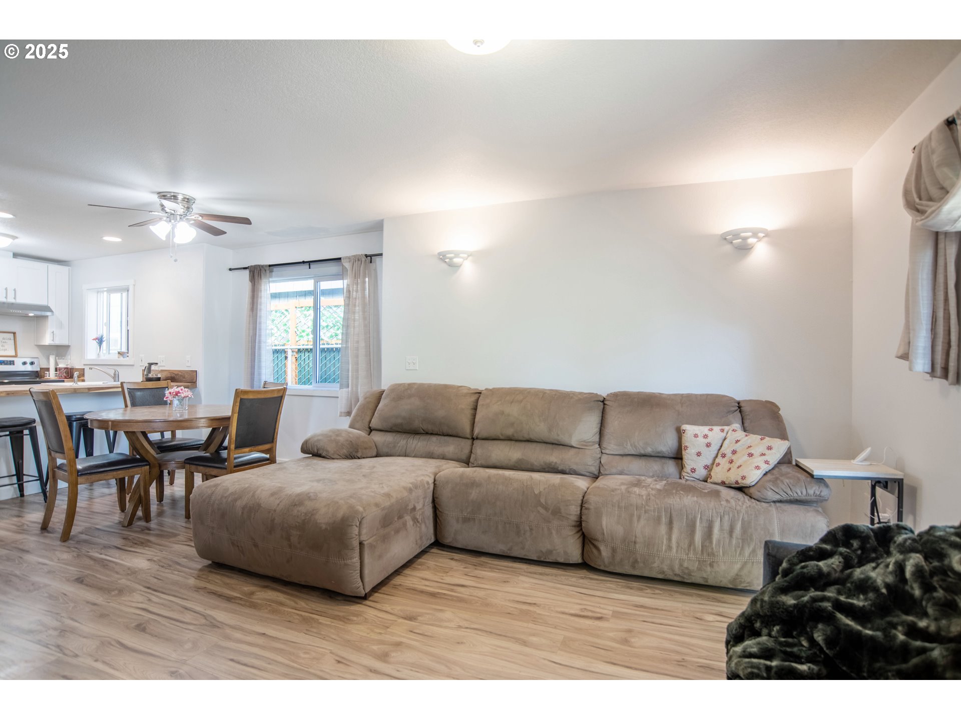 9809 North Exeter Avenue Portland, OR 97203 - Photo 11 of 31 a living room with furniture and a wooden floor
