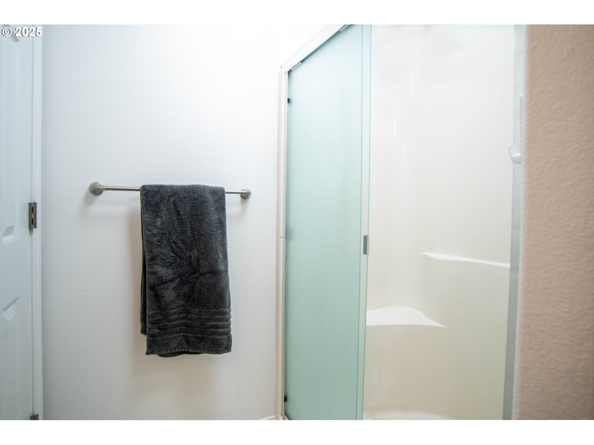 9809 North Exeter Avenue Portland, OR 97203 - Photo 16 of 31 a bathroom with a shower and a sink