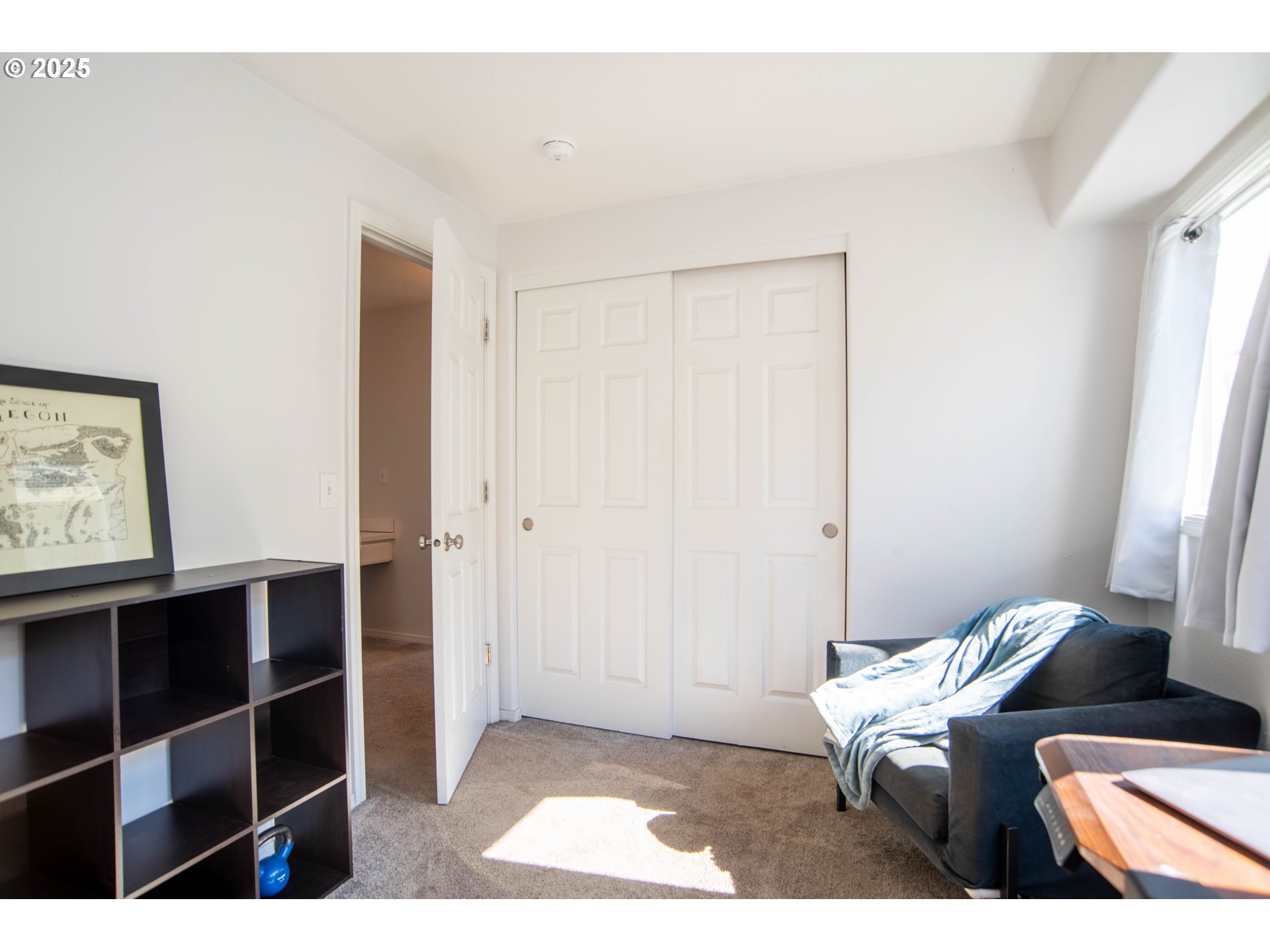 9809 North Exeter Avenue Portland, OR 97203 - Photo 19 of 31 a view of a bedroom with a bed and a window