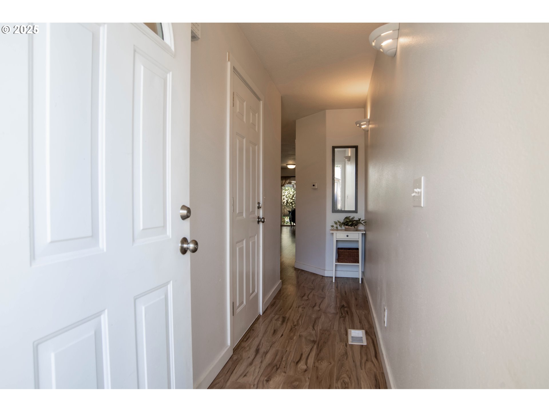 9809 North Exeter Avenue Portland, OR 97203 - Photo 3 of 31 a view of hallway with wooden floor