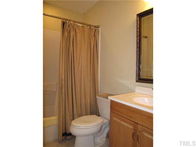 2800 Wycliff Road Raleigh, NC 27607 - Photo 14 of 23 a bathroom with a sink a toilet and shower