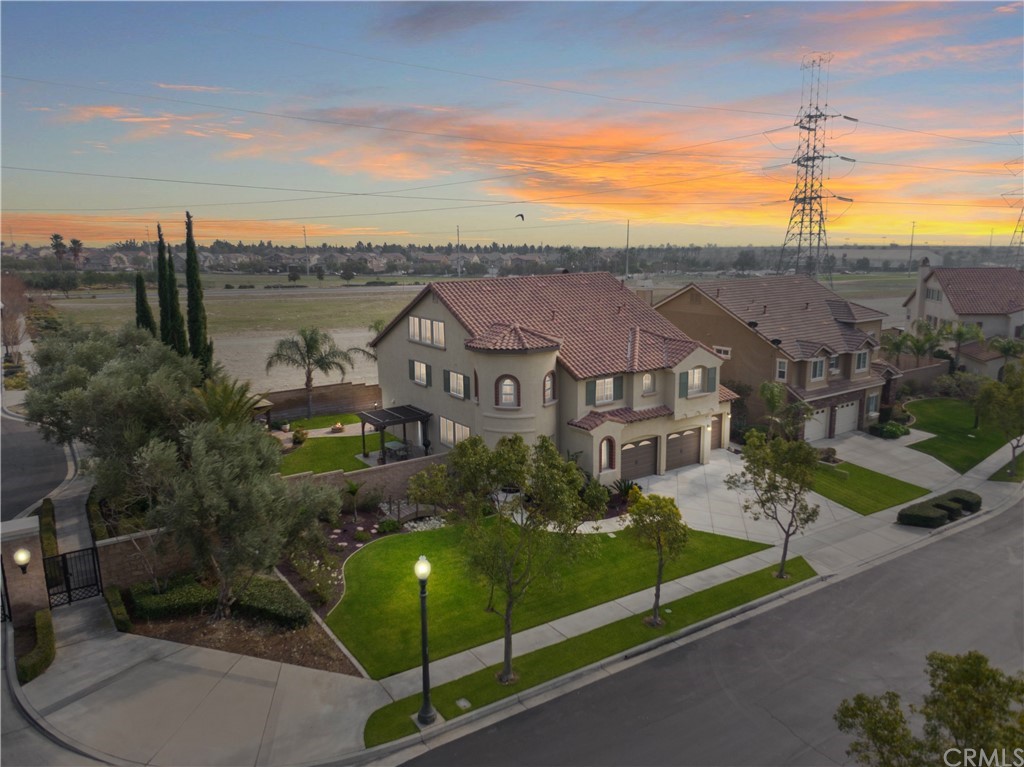 5381 Campania Way Fontana, CA 92336 - Photo 2 of 45 a view of a city with an ocean view