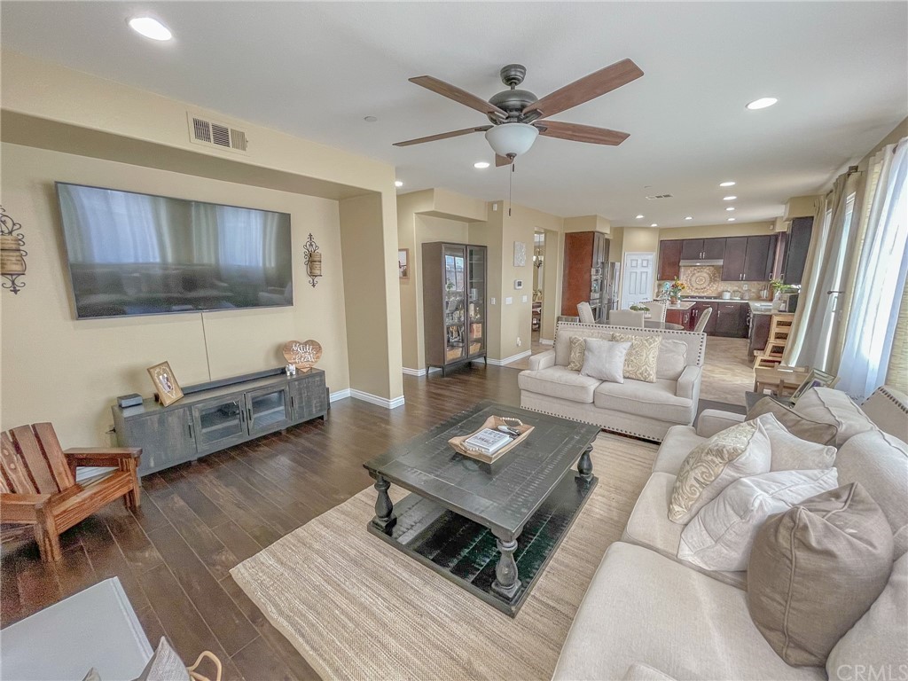 5381 Campania Way Fontana, CA 92336 - Photo 10 of 45 a living room with furniture and a flat screen tv