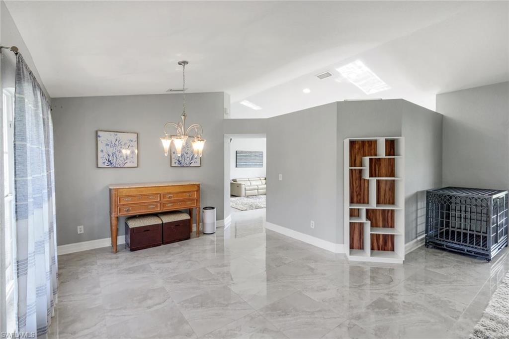 3780 12th Avenue Southeast Naples, FL 34117 - Photo 15 of 43 a view of livingroom with furniture and window