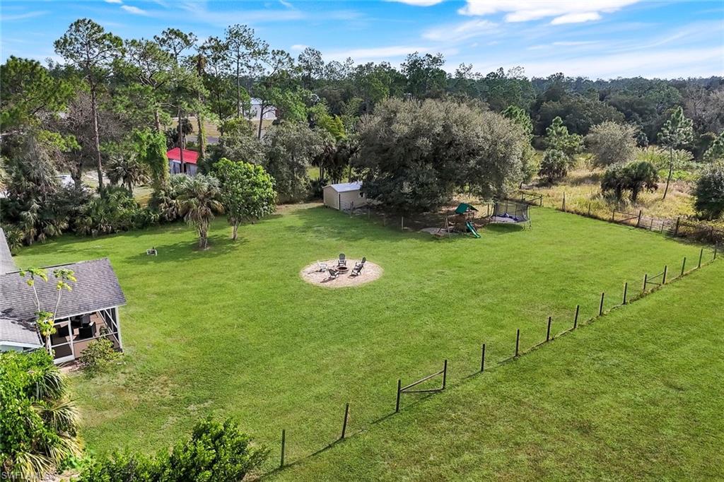 3780 12th Avenue Southeast Naples, FL 34117 - Photo 31 of 43 a view of a golf course with chairs