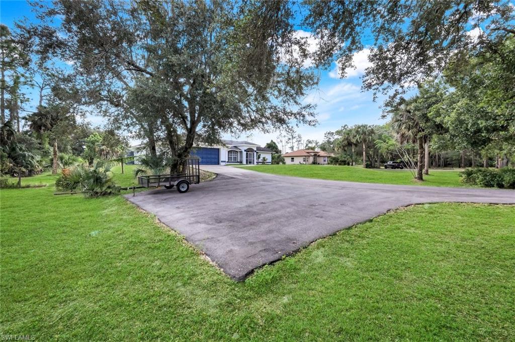 3780 12th Avenue Southeast Naples, FL 34117 - Photo 38 of 43 a view of a park with large trees