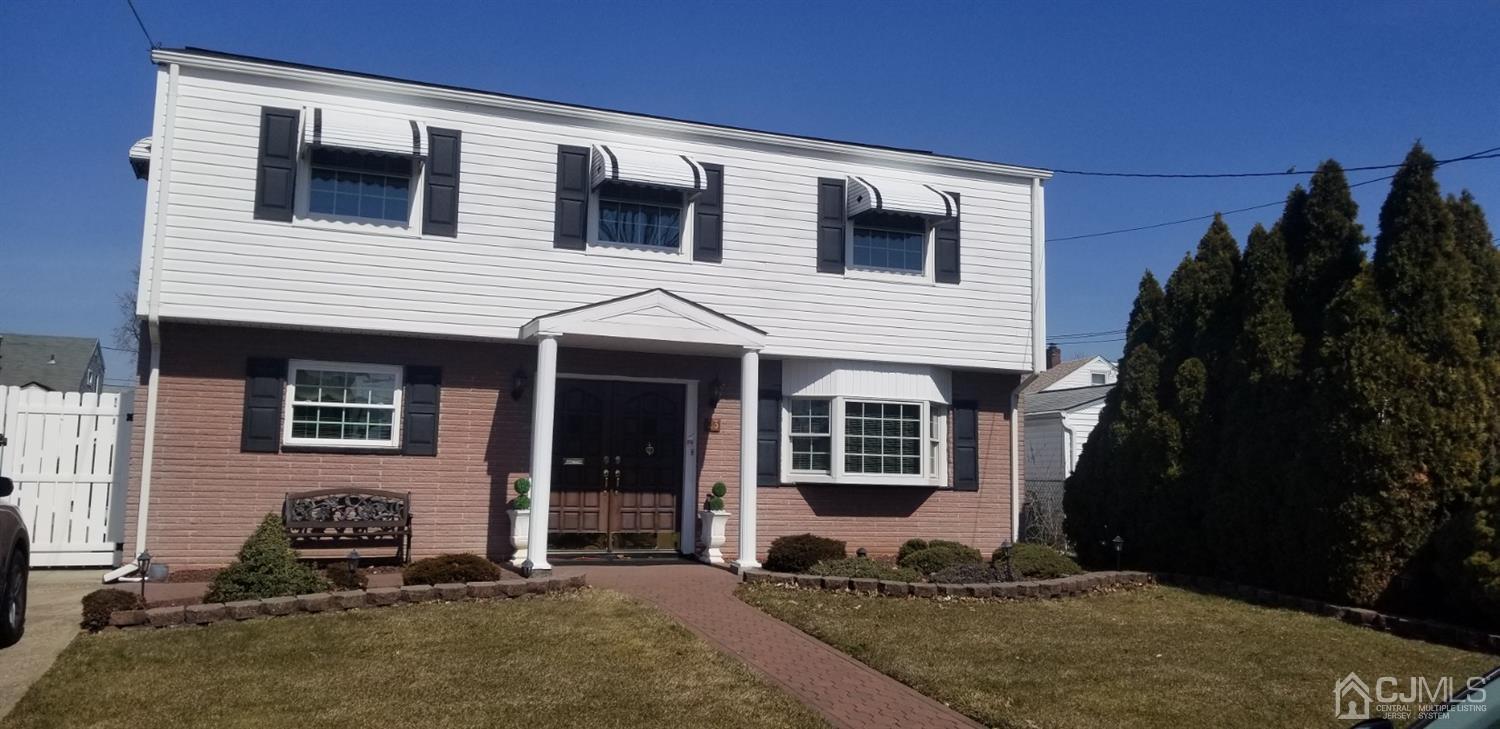 a house view with a backyard space