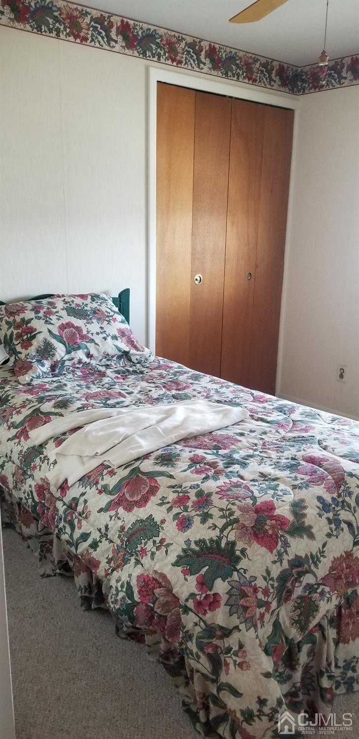 23 Spruce Street Port Reading, NJ 07064 - Photo 14 of 19 a view of a livingroom with an empty space