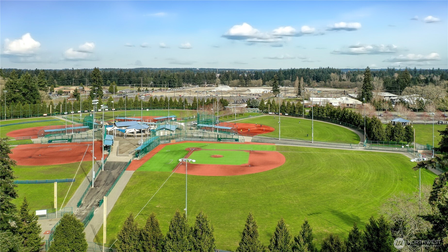918 Gregory Way Southeast Olympia, WA 98513 - Photo 19 of 21 a view of a swimming pool with a yard and outdoor seating