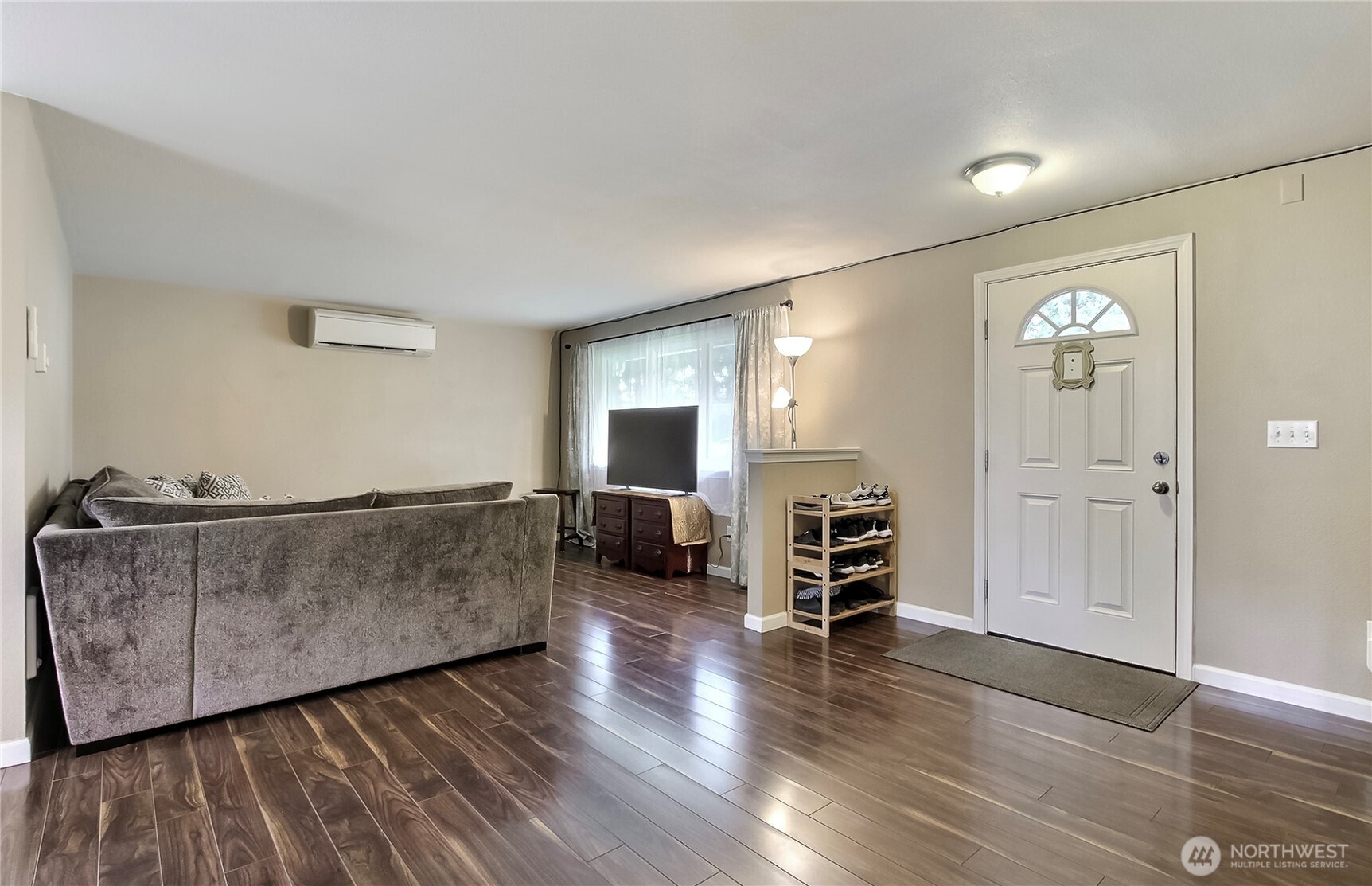918 Gregory Way Southeast Olympia, WA 98513 - Photo 3 of 21 a living room with furniture and wooden floor