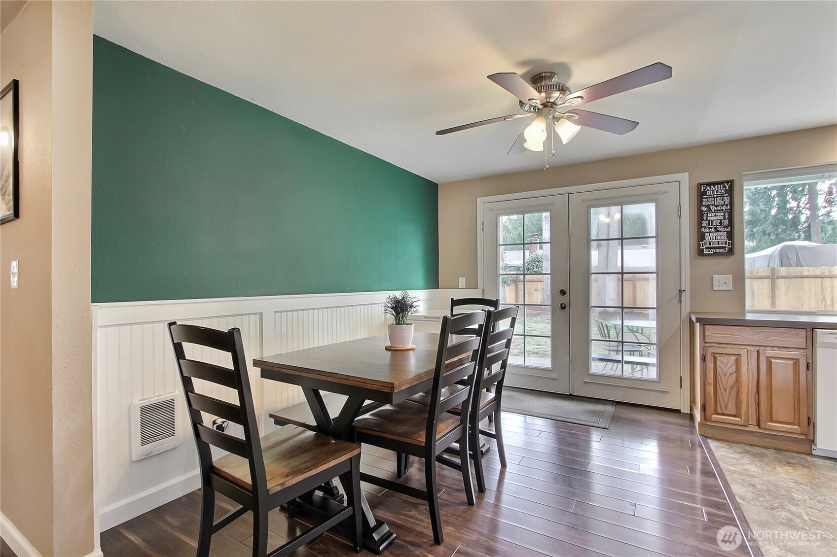 918 Gregory Way Southeast Olympia, WA 98513 - Photo 6 of 21 a view of a dining room with furniture and wooden floor