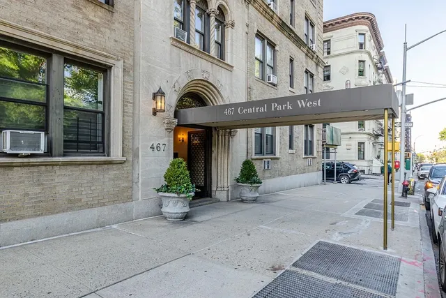 a view of a building with sitting area