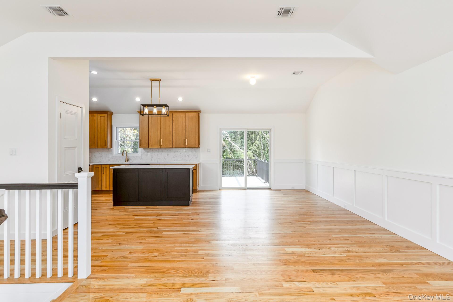 92 Park Street Blue Point, NY 11715 - Photo 20 of 32 a view of a kitchen with a sink and a fireplace