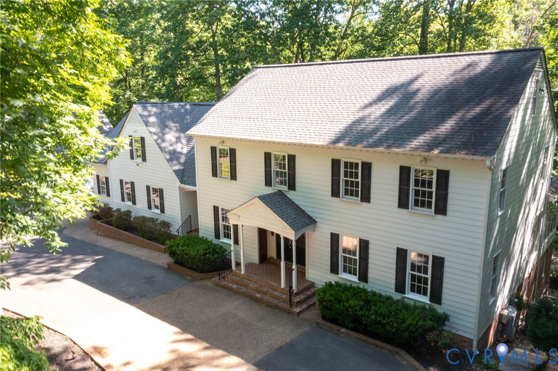 3201 East Brigstock Road Midlothian, VA 23113 - Photo 72 of 72 a aerial view of a house next to a yard