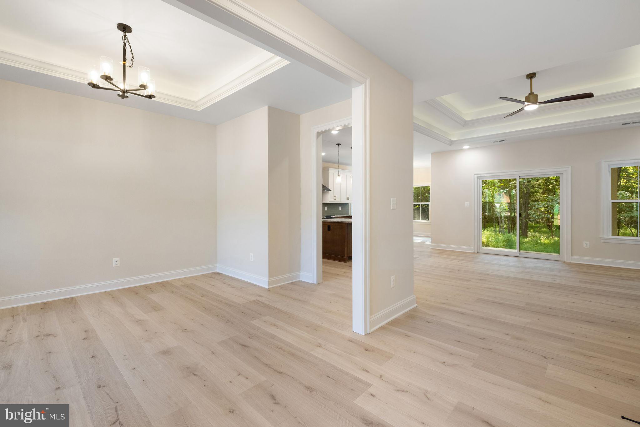 7329 Riley Road Warrenton, VA 20187 - Photo 14 of 69 a view of empty room with wooden floor and window