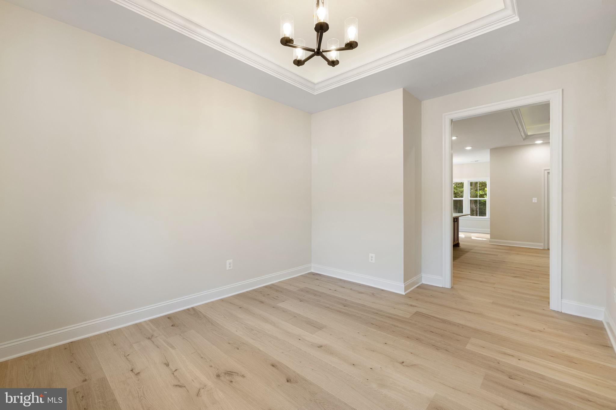 7329 Riley Road Warrenton, VA 20187 - Photo 18 of 69 wooden floor in an empty room with a window