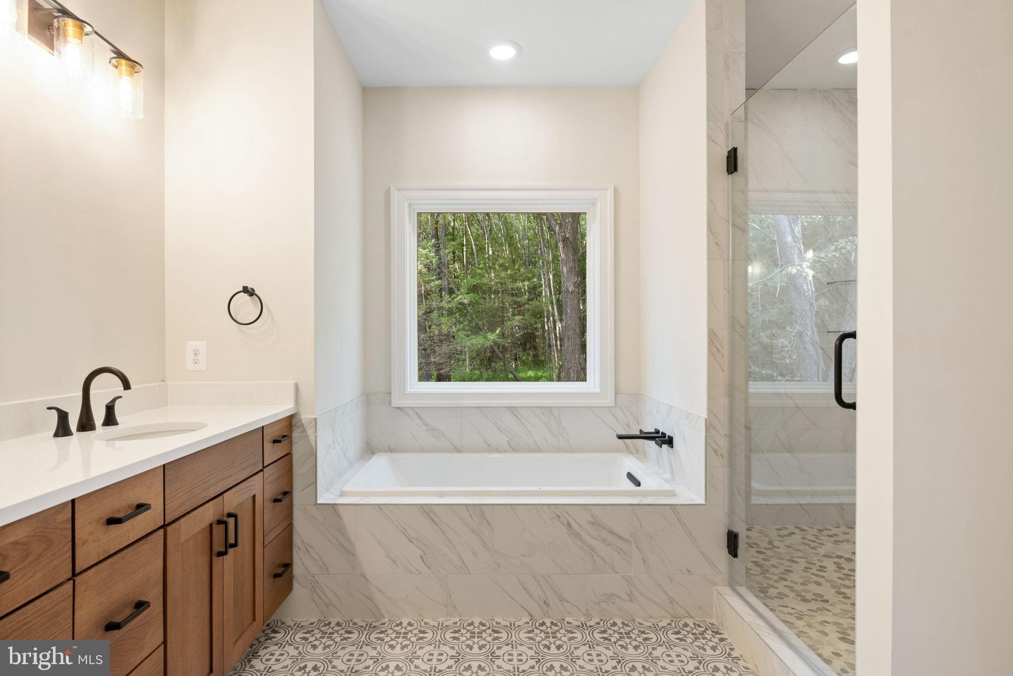 7329 Riley Road Warrenton, VA 20187 - Photo 59 of 69 Serene bathroom with nature views.