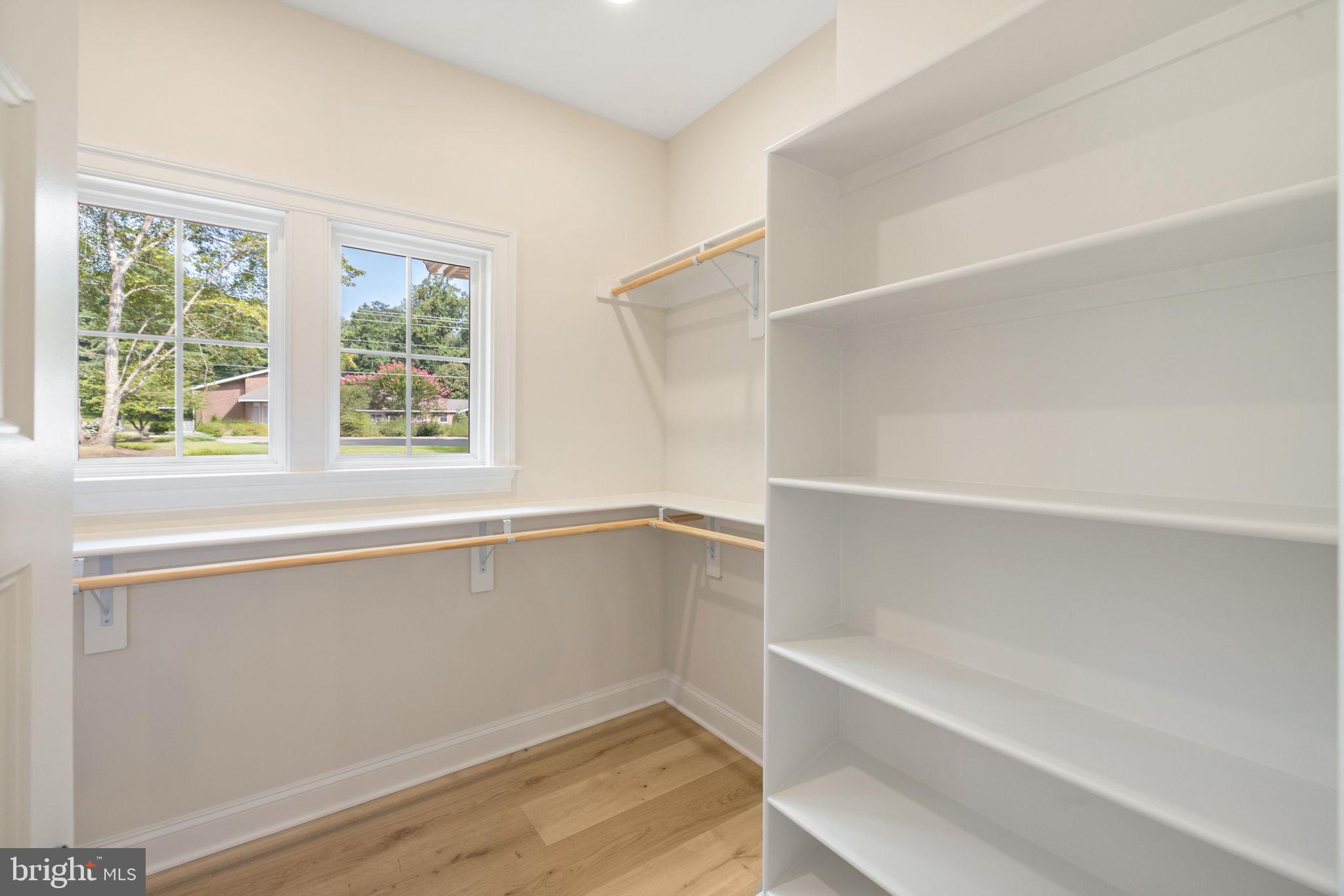 7329 Riley Road Warrenton, VA 20187 - Photo 62 of 69 a bathroom with a bathtub and a window