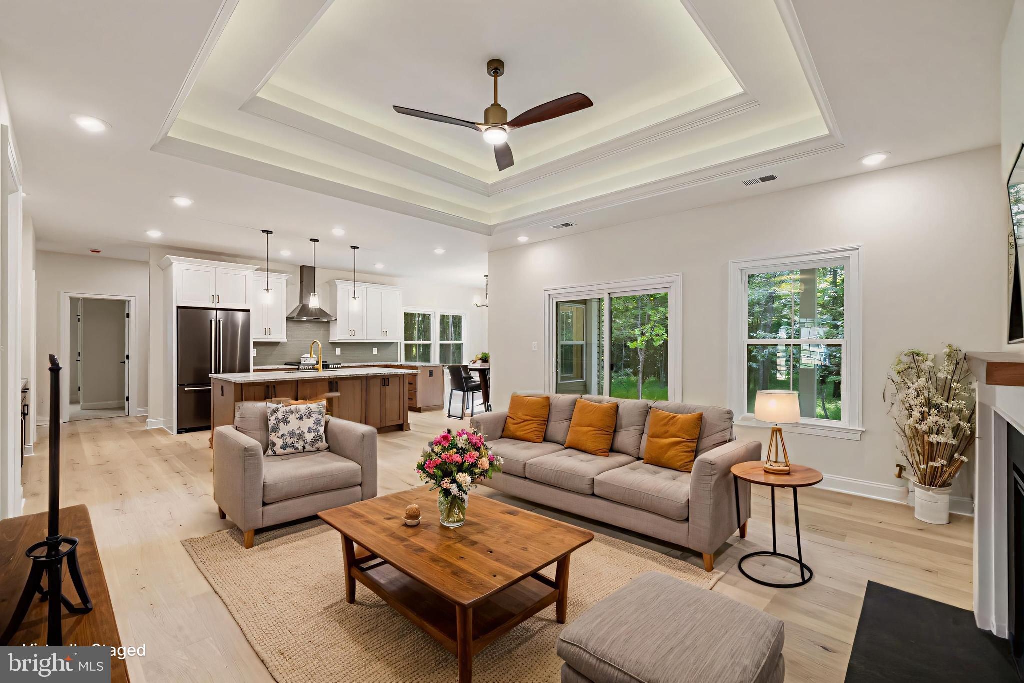 7329 Riley Road Warrenton, VA 20187 - Photo 9 of 69 a living room with furniture kitchen view and a large window