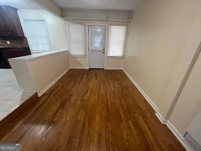 a view of wooden floor and staircase