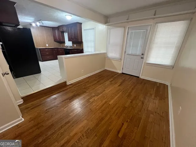 a view of a kitchen with a sink and a dishwasher